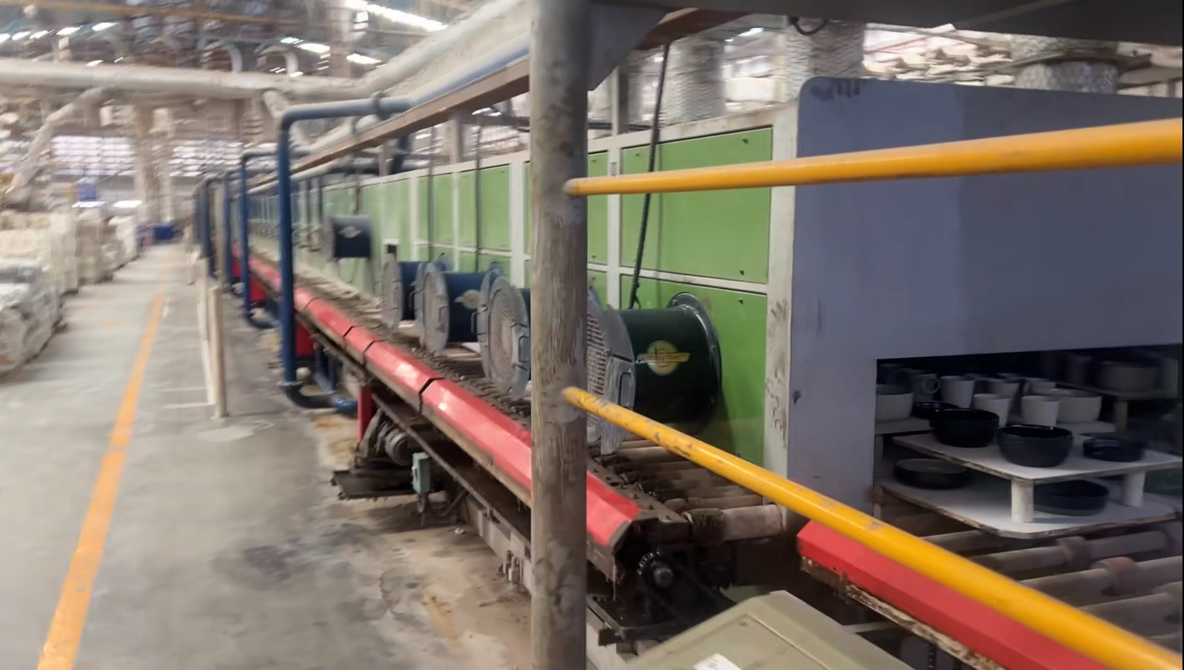 Ceramic pieces being loaded into a kiln